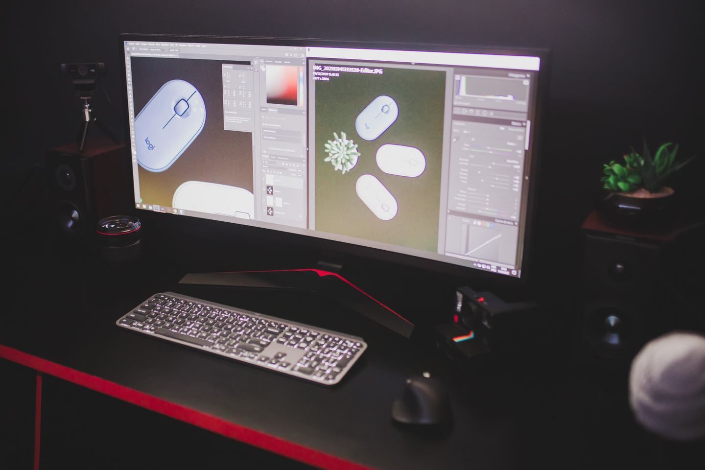 Photograph: A sleek computer setup with dual monitors, keyboard, and mouse in a dark room.